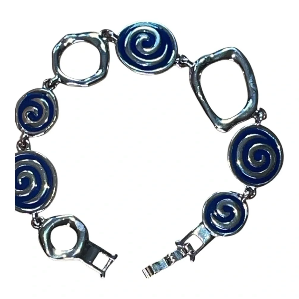 Lia Sophia bracelet, silver tone with blue enamel discs, no signs of wear